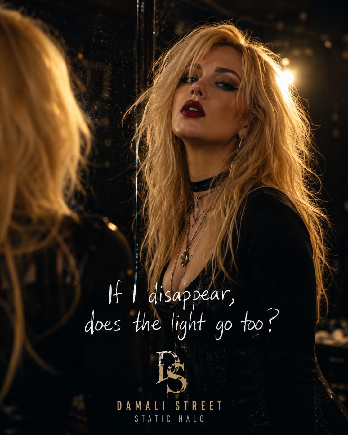 Damali Street in a dark mirror with a bright light behind her